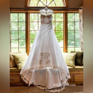 A-line wedding dress w/ sweetheart neckline & custom lace, organza & tulle